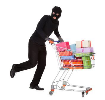 Thief pushing a trolley of gifts
